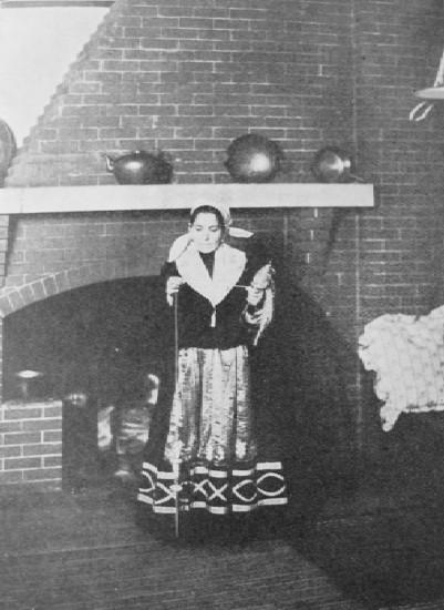 ITALIAN WOMAN SPINNING FLAX