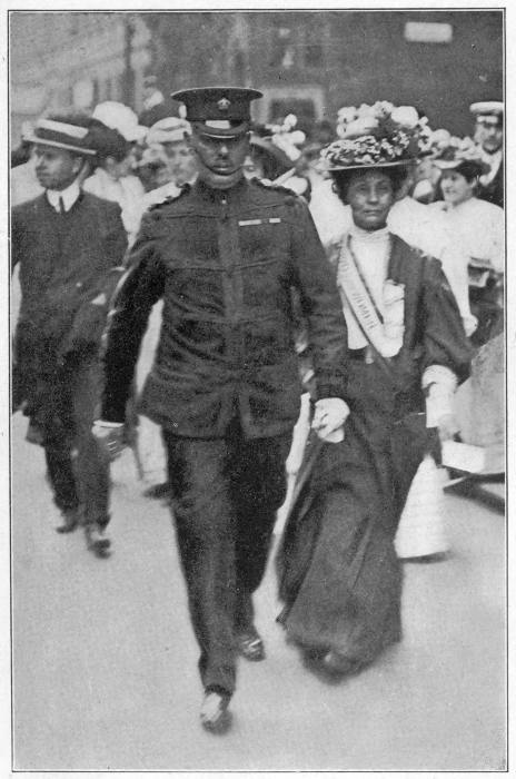 INSPECTOR WELLS CONDUCTING MRS. PANKHURST TO THE HOUSE OF
COMMONS June, 1908