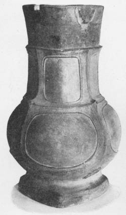 VASE OF BRONZE FORM, UNGLAZED STONEWARE