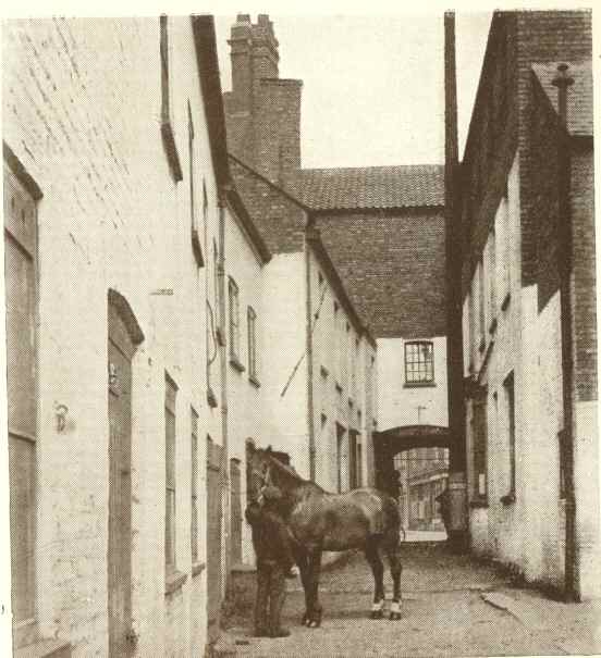 The “George” Inn Yard at Horncastle.  Photo.
Carlton