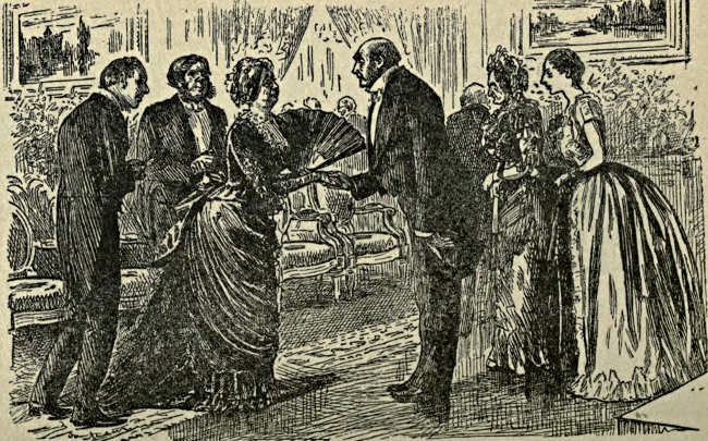 Gentleman greeting a lady at a party