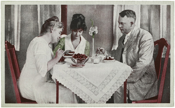 Family eating strawberries